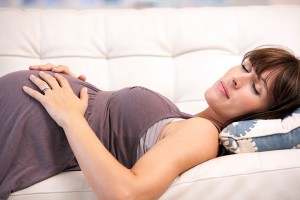 Pregnant woman resting at home